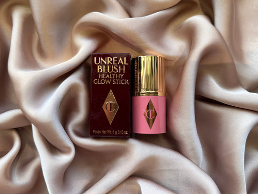 Charlotte Tilbury 
Mini Unreal Lip + Cheek Glow Blush Stick with Hyaluronic Acid