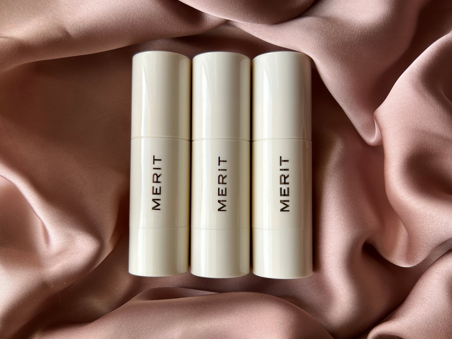 MERIT 
Day Glow Dewy Highlighting Balm