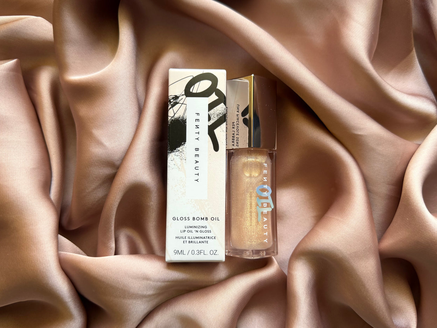 Fenty Beauty by Rihanna 
Gloss Bomb Oil Luminizing Lip Oil 'N Gloss