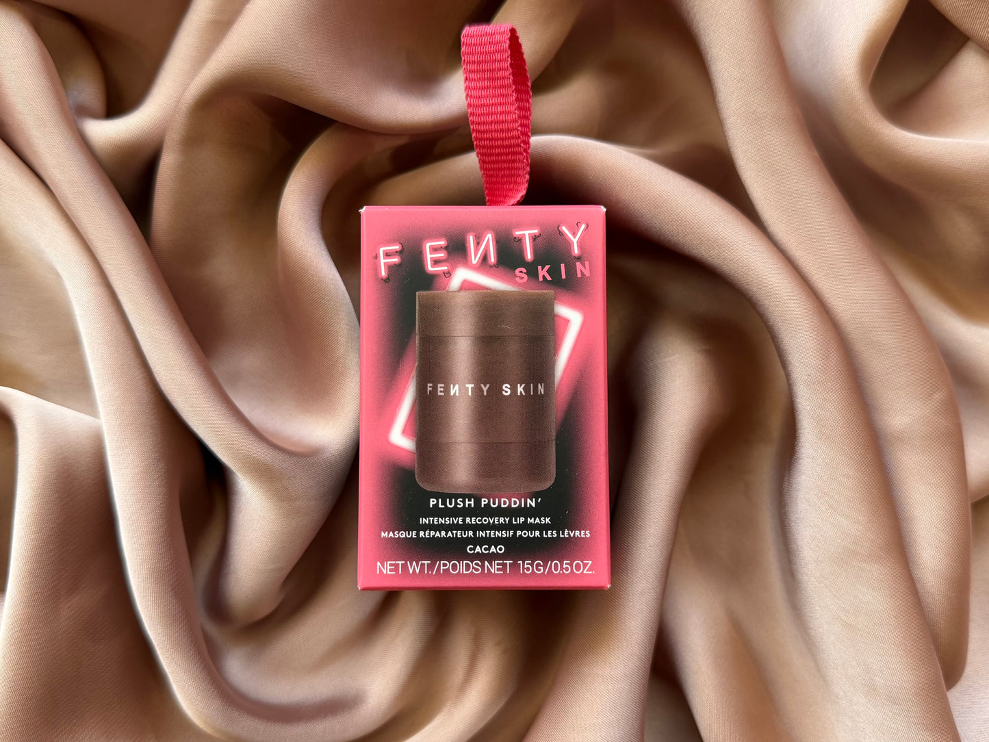 Fenty Beauty by Rihanna 
Plush Puddin’ Intensive Recovery Lip Mask With Pomegranate Sterols + Vitamin E
