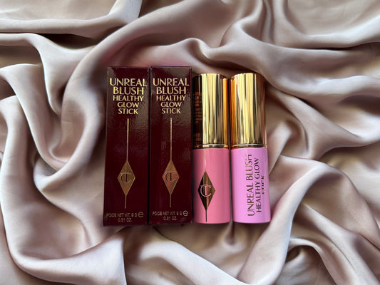 Charlotte Tilbury 
Unreal Lip + Cheek Glow Blush Stick with Hyaluronic Acid