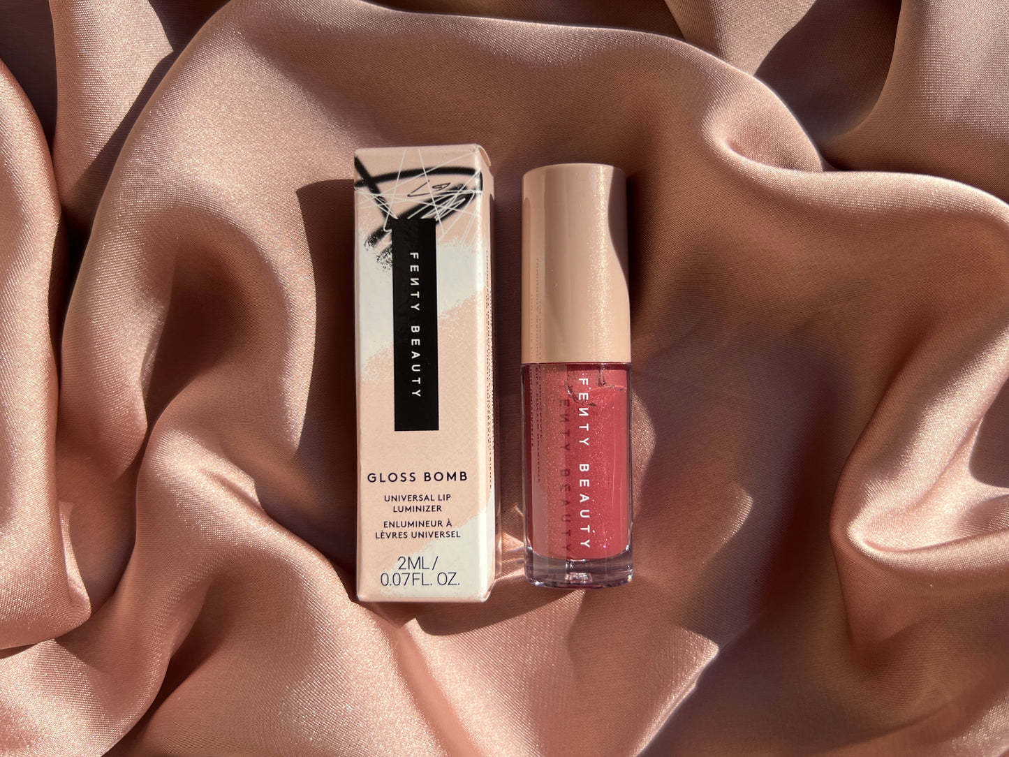 Fenty Beauty by Rihanna 
Gloss Bomb Universal Lip Luminizer