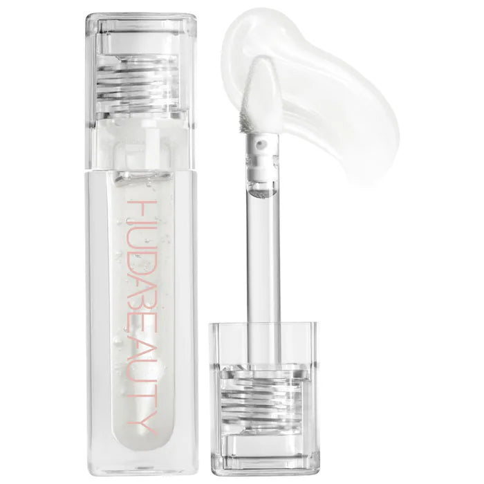 HUDA BEAUTY 
Faux Filler Shiny Non-Sticky Lip Gloss