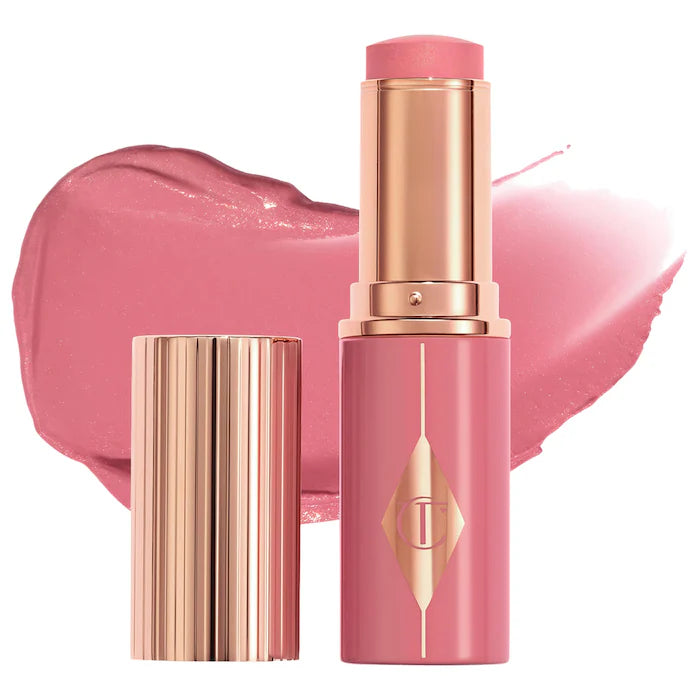 Charlotte Tilbury 
Unreal Lip + Cheek Glow Blush Stick with Hyaluronic Acid