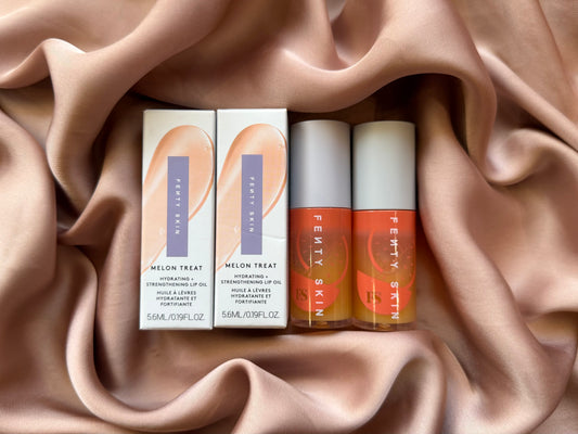Fenty Beauty by Rihanna 
Fenty Treatz Hydrating + Strengthening Lip Oil